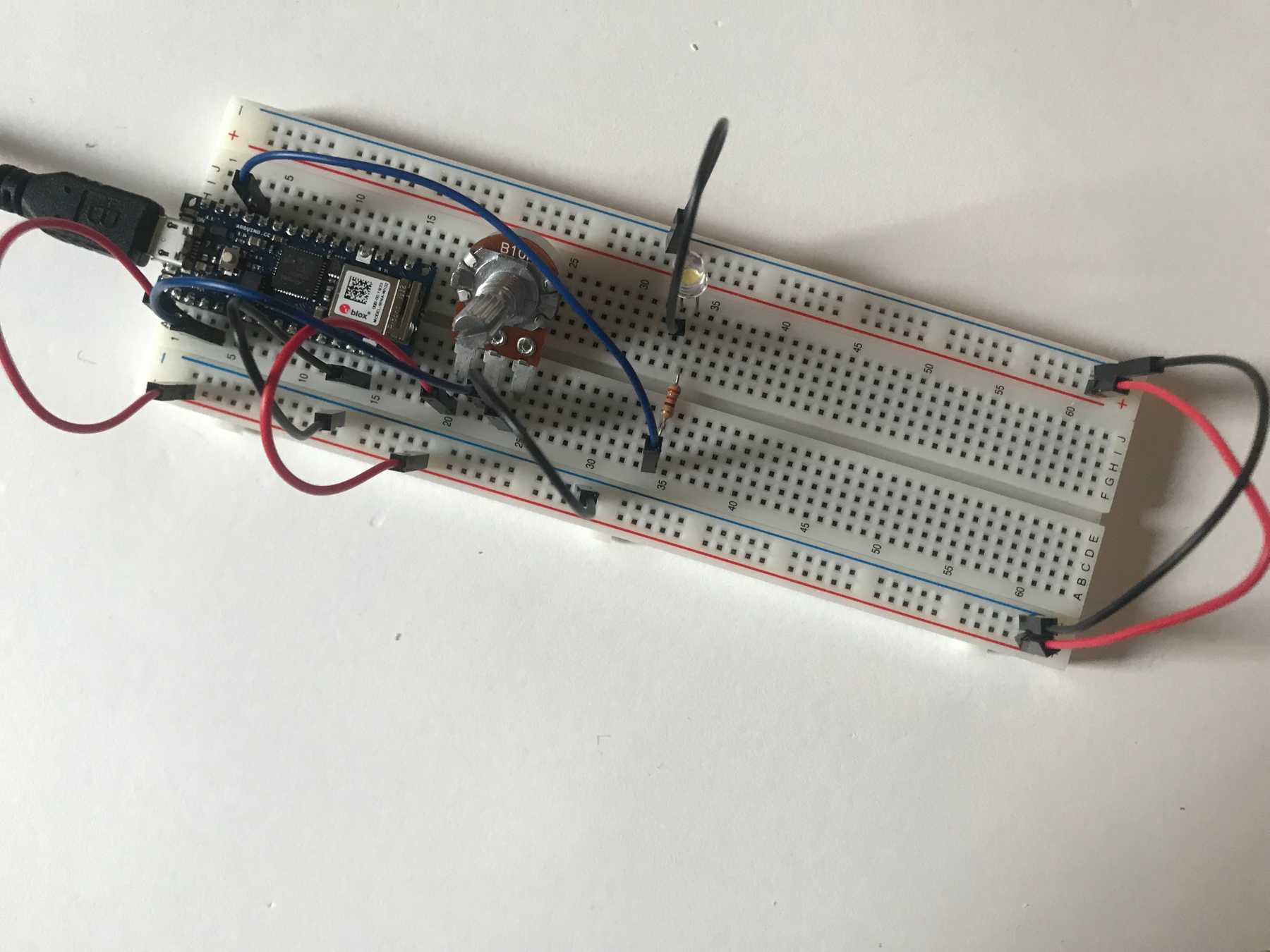 The potentiometer and LED connected to the Arduino